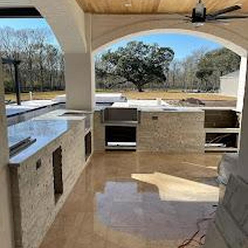 Outdoor kitchen countertop and built-in grill setup