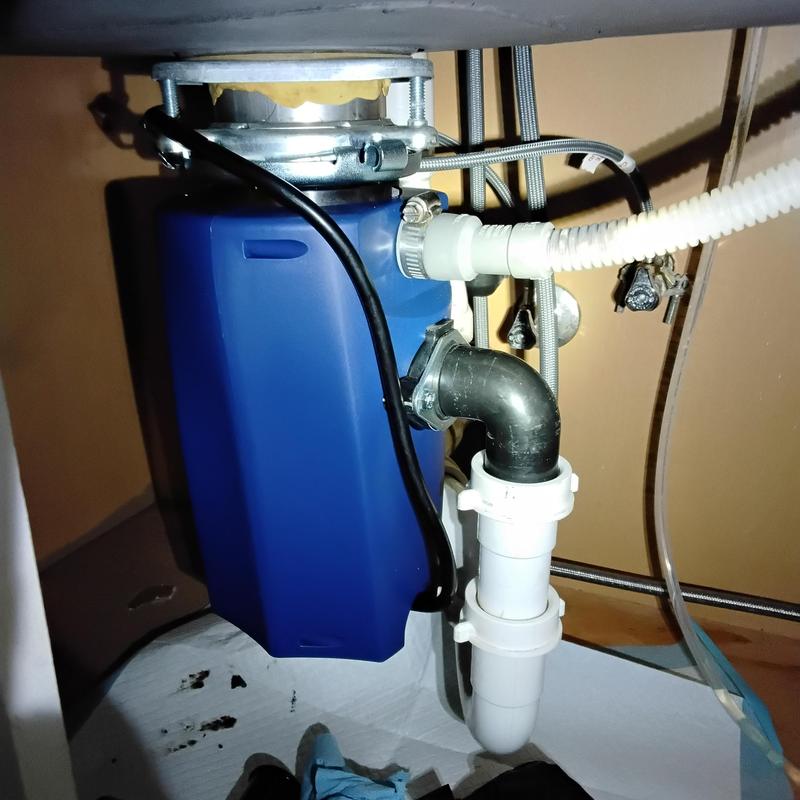 12 HP garbage disposal with new plumbing shield installed