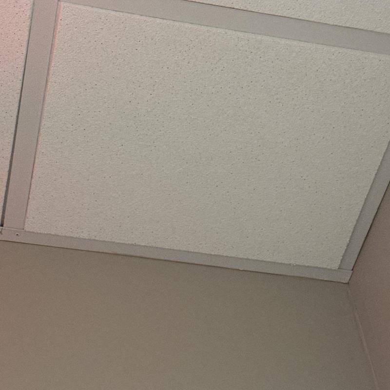 Ceiling tile installation in interior corner