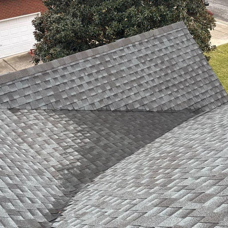 Asphalt shingle roof with hail damage inspection