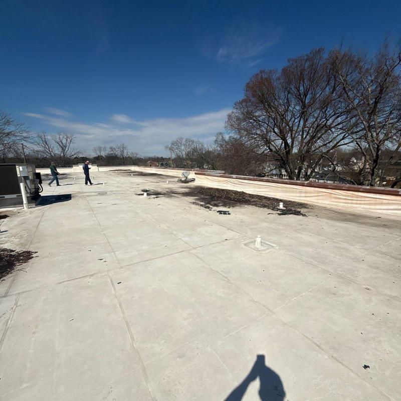 Commercial flat roofing membrane with hail damage inspection