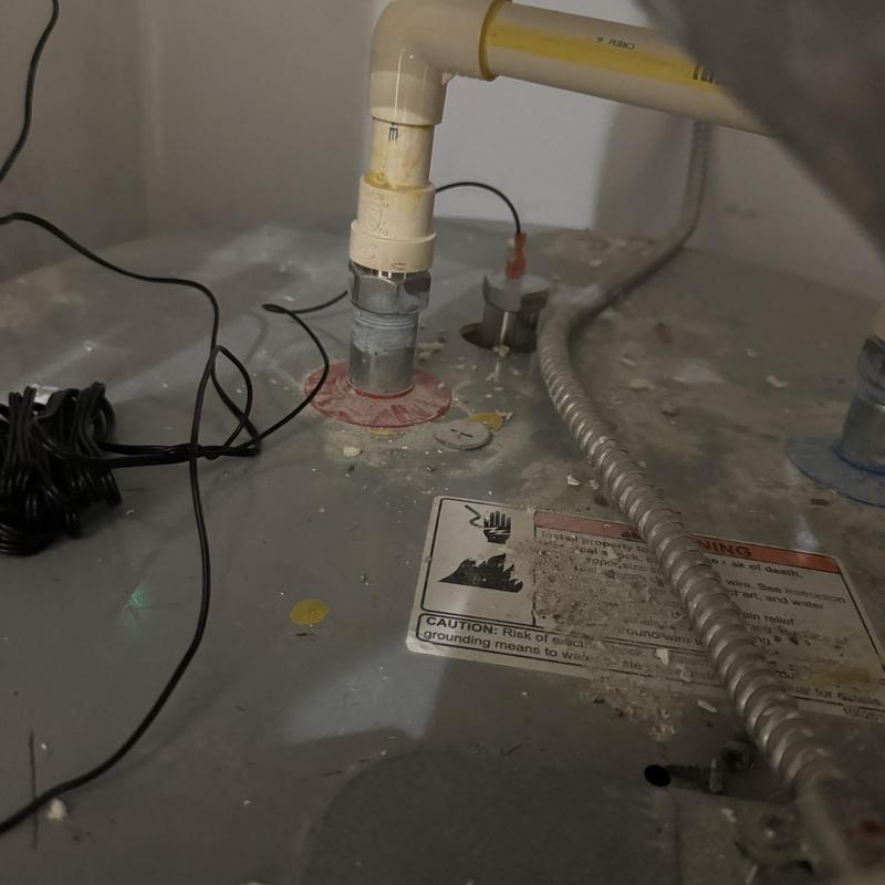 Power anode rod installation on water heater tank