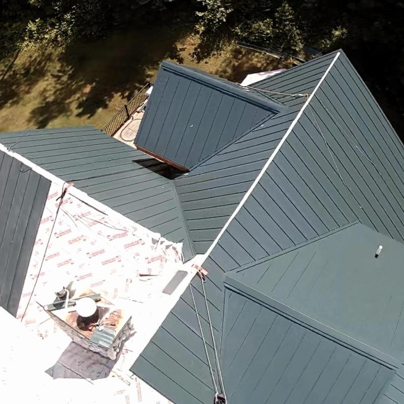 24-gauge Image II standing seam steel roof installation 24-gauge Image II standing seam steel roof installation