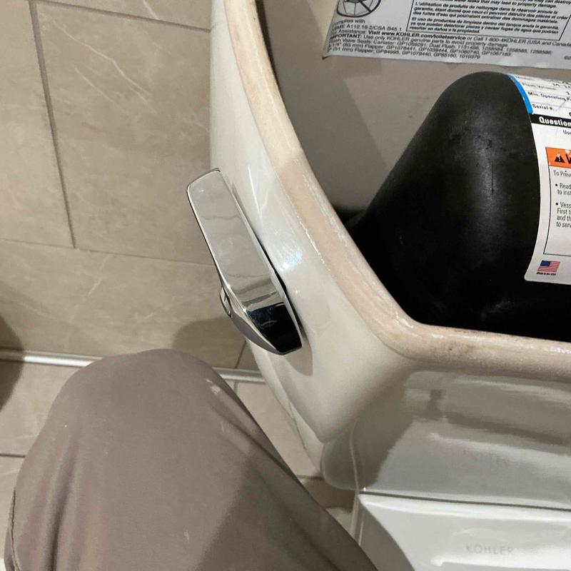 Toilet flush lever replacement on ceramic tank
