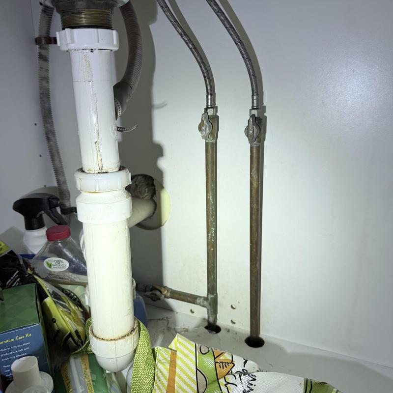 Dishwasher shut off valves under sink with pipes