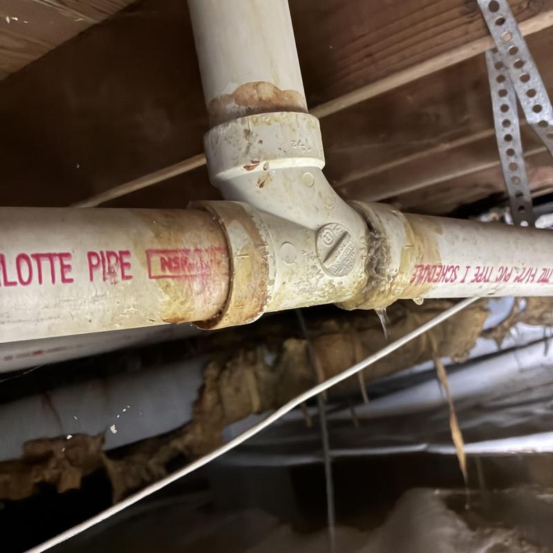 Drain pipe leak with PVC fittings in crawlspace