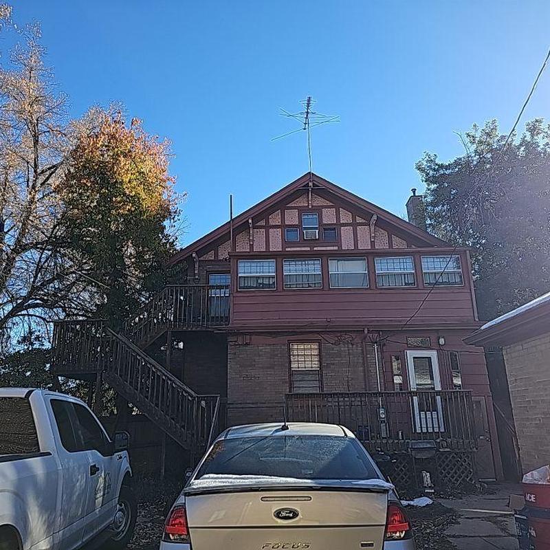 Shingle roof with hail damage and aged shingles
