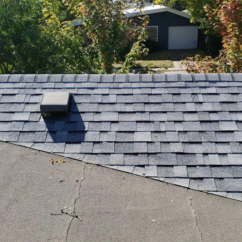 Shingle roof valley with flat roof leak issues