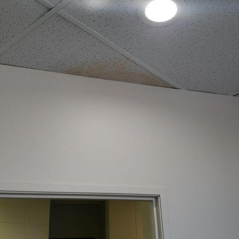 Ceiling water damage from roof drain leaks