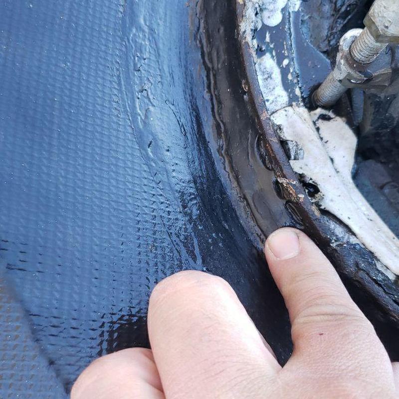 Roof drain and seal inspection with visible wear