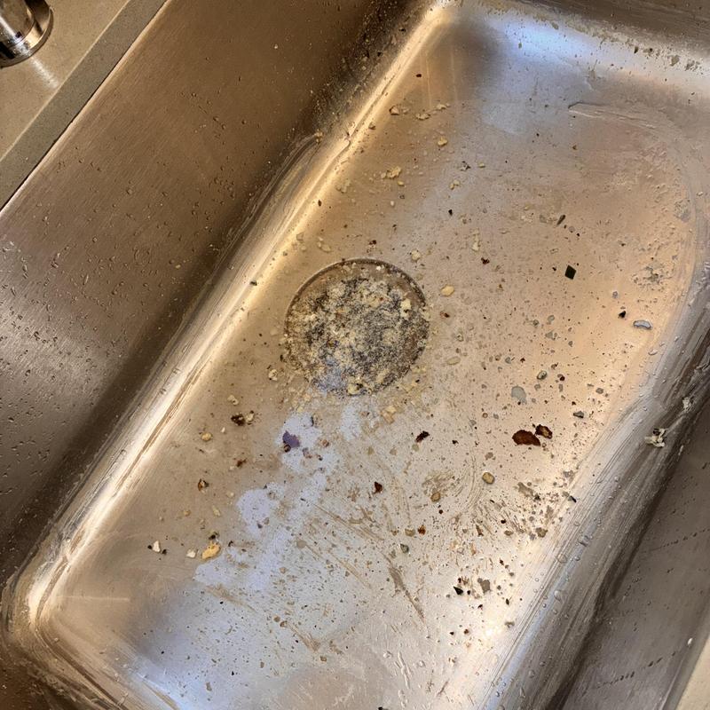 Kitchen sink drain with grease and debris buildup
