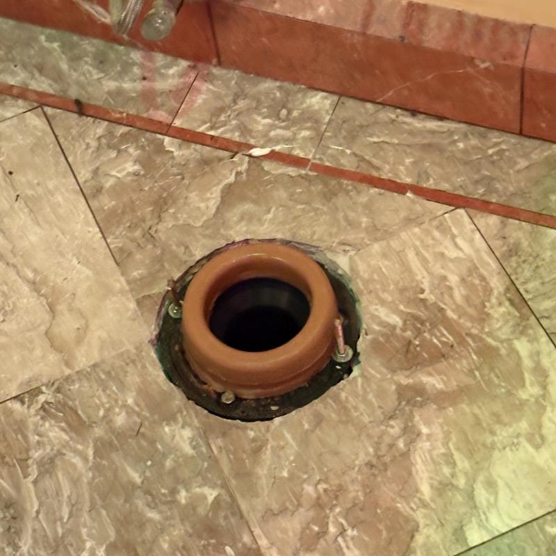 Toto toilet flange with new wax ring installed