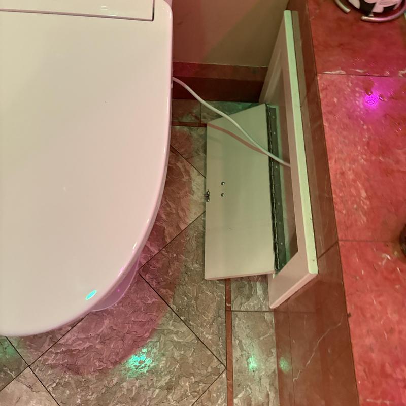 Toto two-piece toilet with bidet installation detail