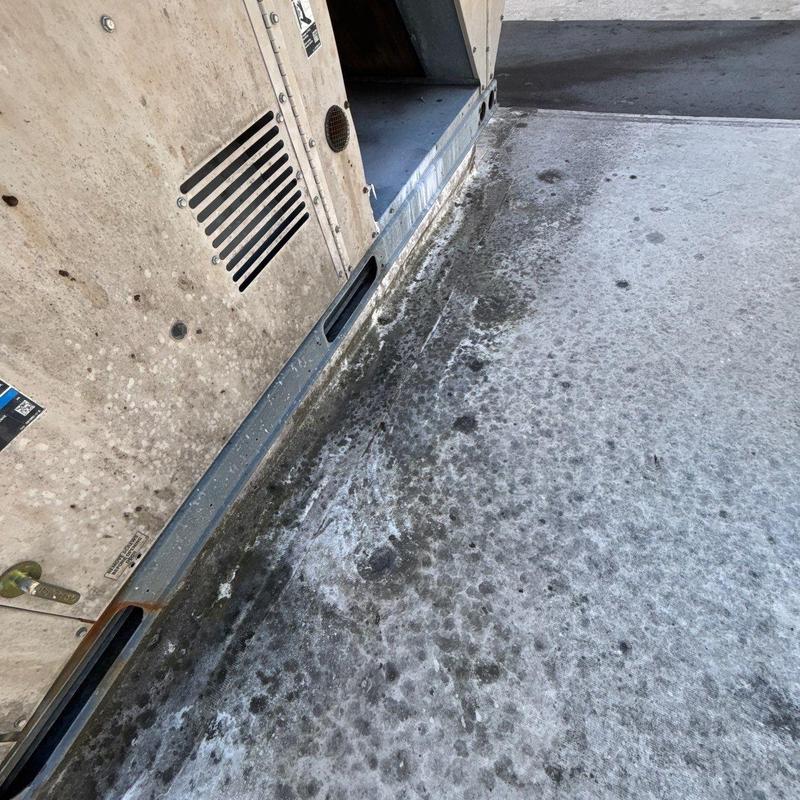 Commercial roofing system hail damage on flashing and surface