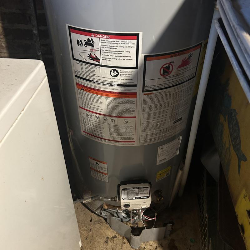 Gas valve regulator and pilot assembly on water heater