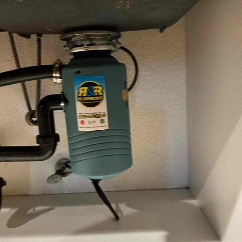 Garbage disposal installed under kitchen sink