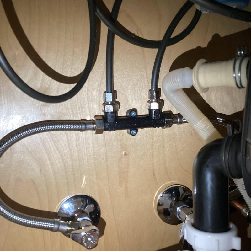 Toilet water supply lines and connections under sink