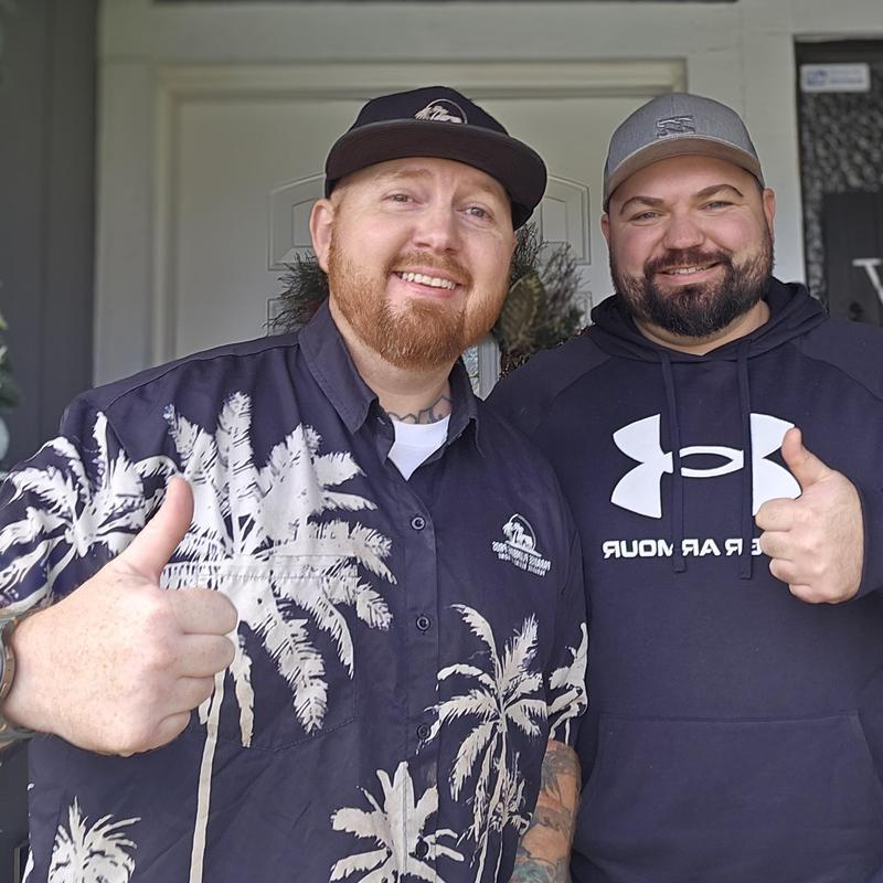 Dishwasher drainage and vanity sink plumbers smiling thumbs up