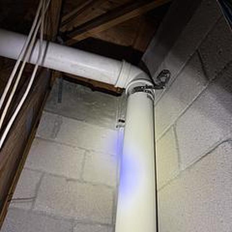 Heater concentric vent pipe reconnected and secured