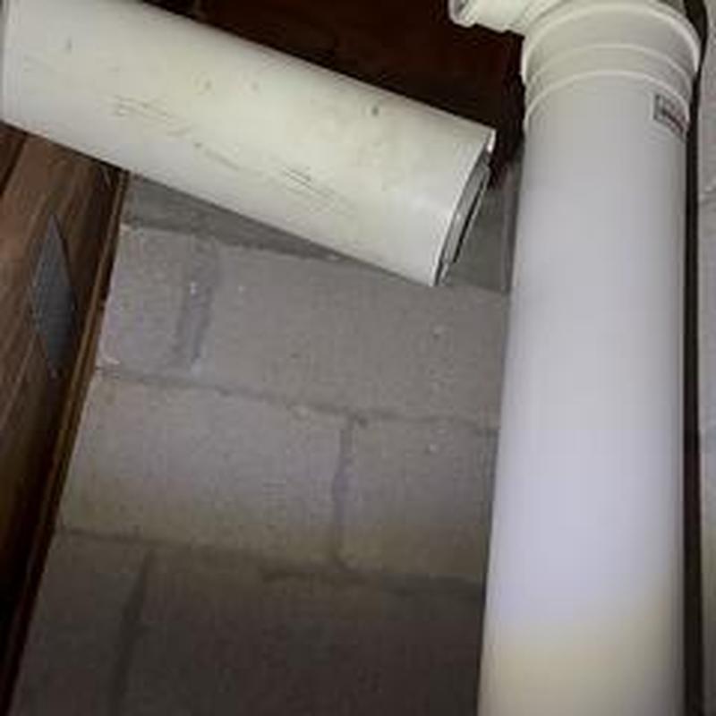 Concentric vent pipe disconnection inside attic wall