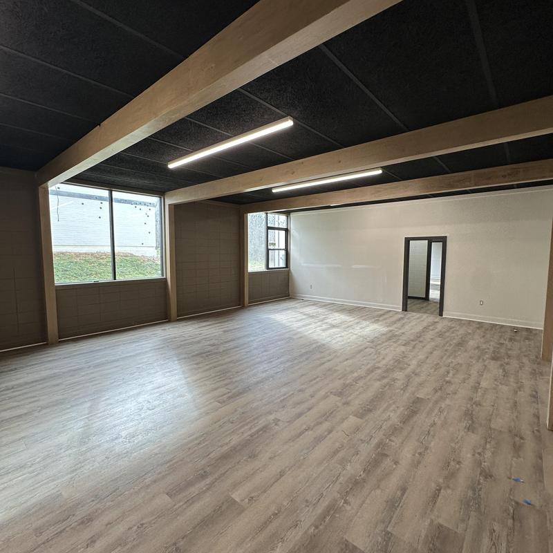 Luxury vinyl plank flooring with cove base installed Luxury vinyl plank flooring with cove base installed