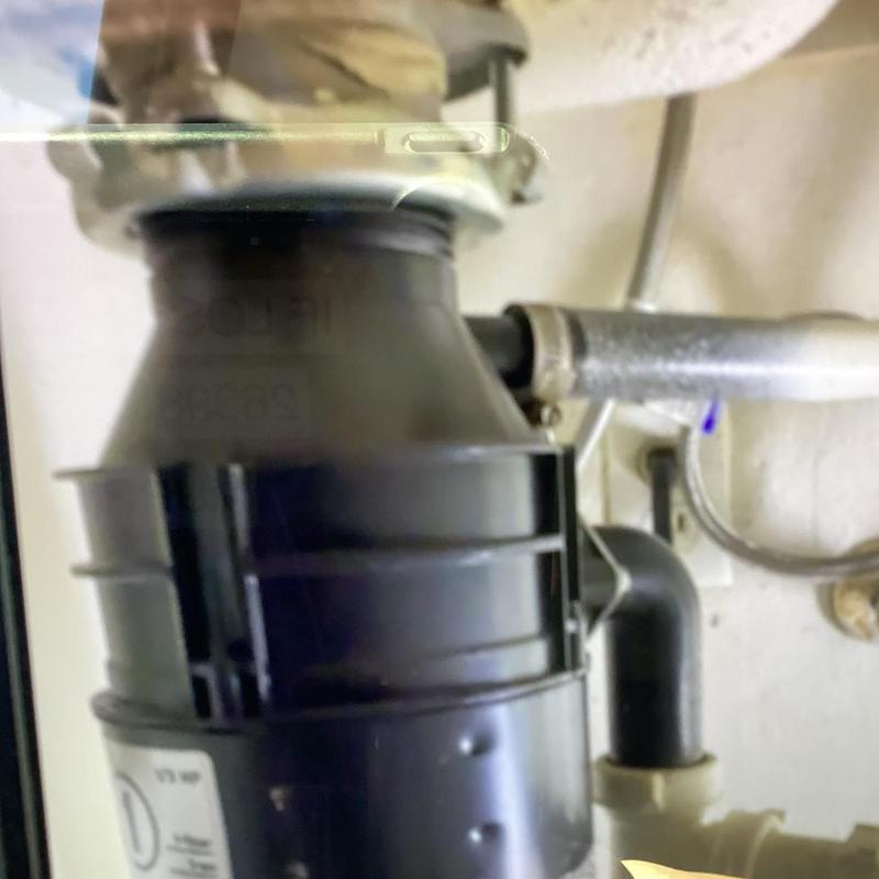 Garbage disposal air gap hose and drain connection