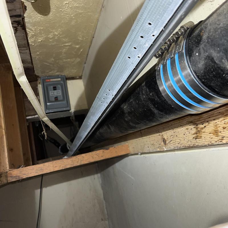 4-inch cast iron basement drain pipe with couplings