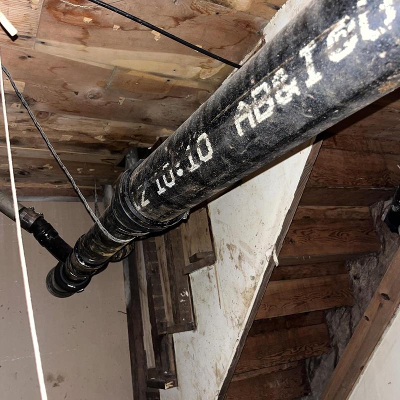 4-inch cast iron basement drain line with couplings