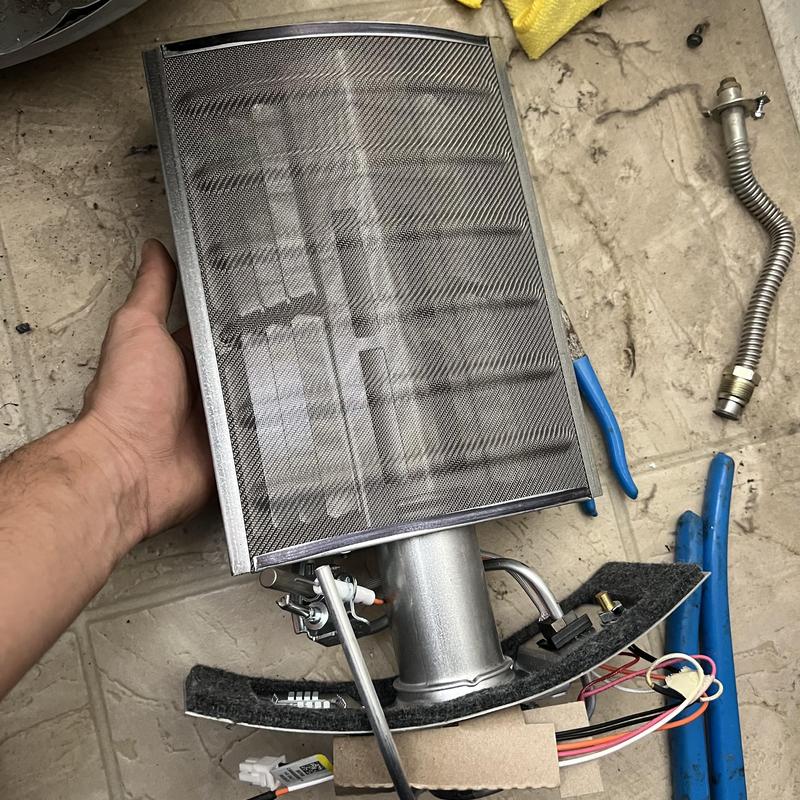 Water heater gas burner with pilot assembly replacement