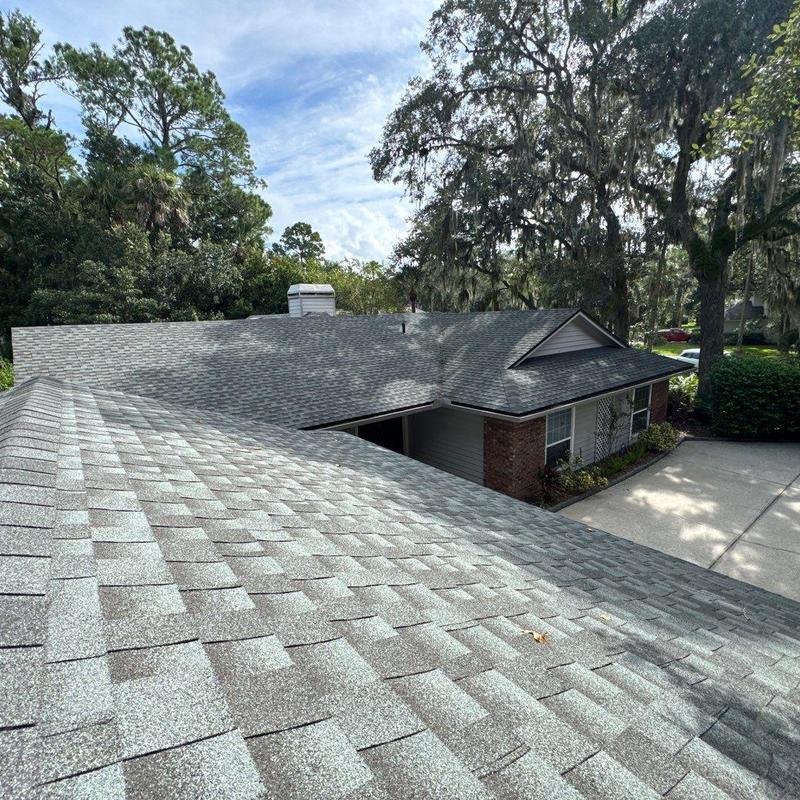 Asphalt shingle roof with replaced leaking shingles Asphalt shingle roof with replaced leaking shingles