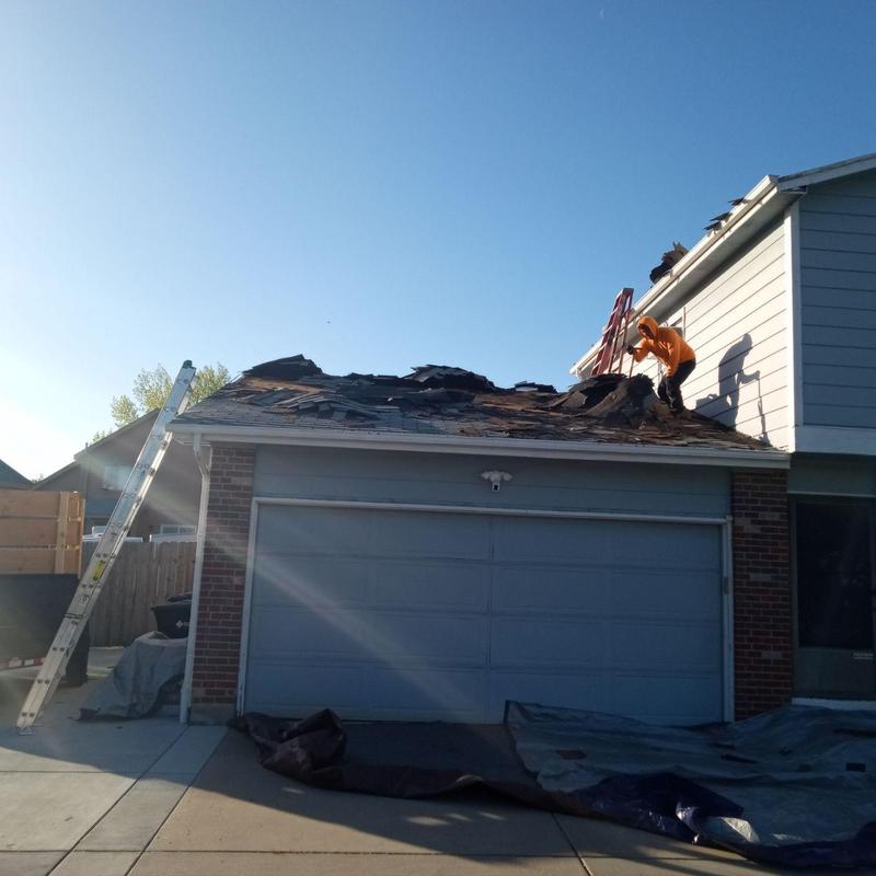 Owens Corning Duration Storm shingles removal on garage roof