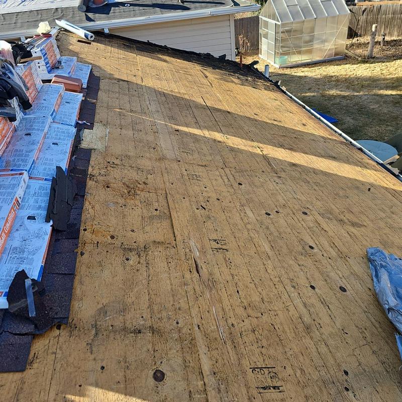 Roof decking with stacked Owens Corning shingles on edge