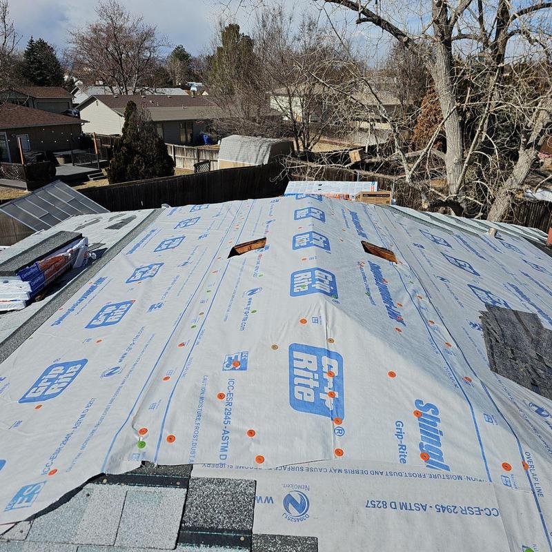 Roof underlayment installation on residential roof in Thornton CO
