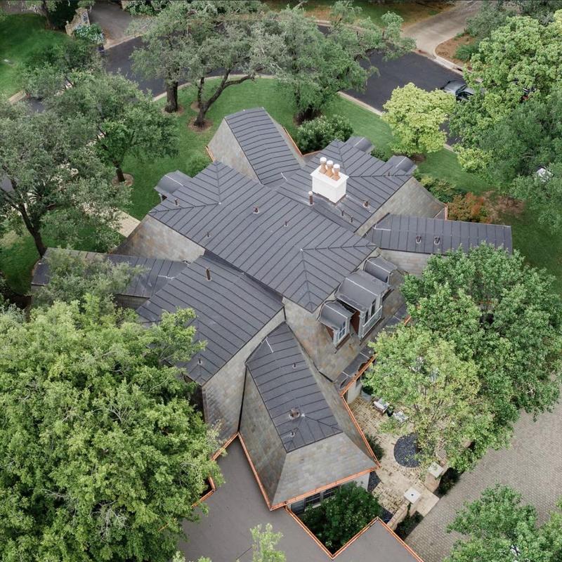 Copper standing seam roof with slate repairs in Austin