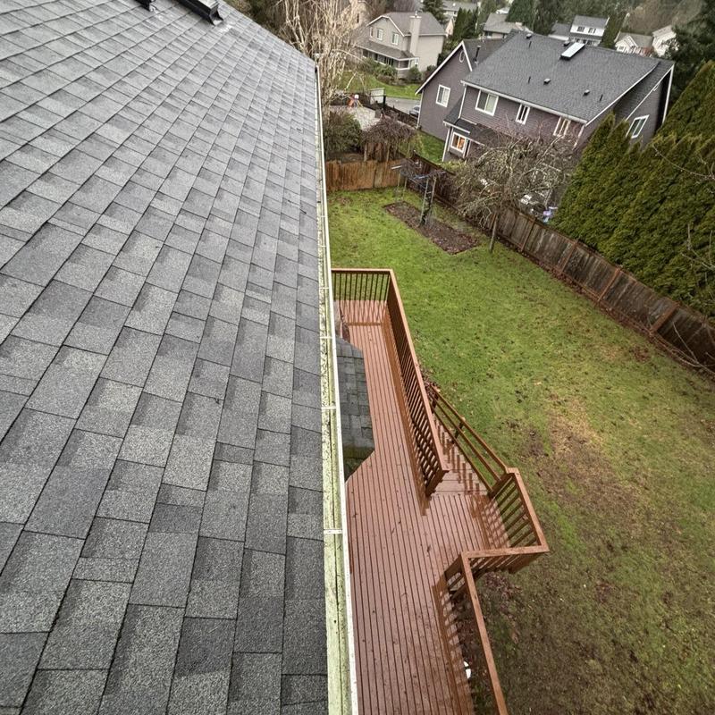 Roof gutters cleared and cleaned after debris removal