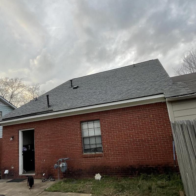 Architect shingles roof installation on brick house Architect shingles roof installation on brick house