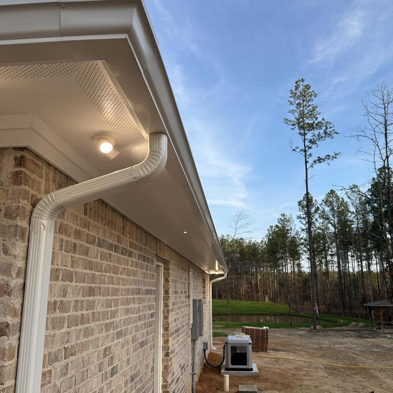 6-inch seamless gutter and downspout installation on home 6-inch seamless gutter and downspout installation on home