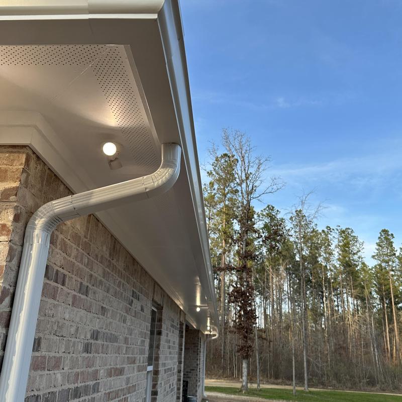 6-inch seamless gutter and downspout installation on home 6-inch seamless gutter and downspout installation on home