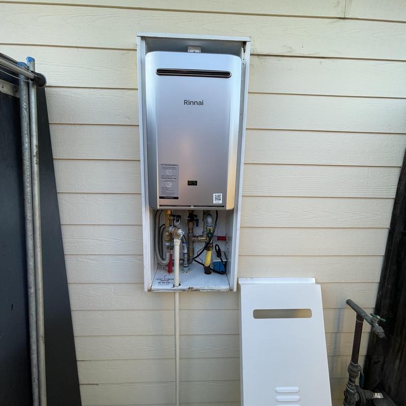 Rinnai tankless water heater in recessed box installation