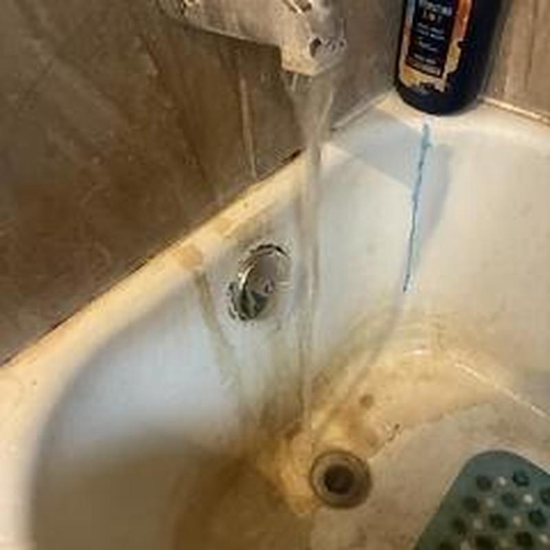 Tub waste overflow plate with water flow and drain