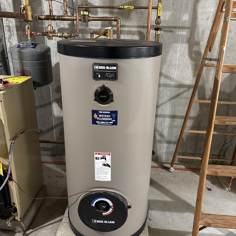 Hot water heater system with pressure adjustment
