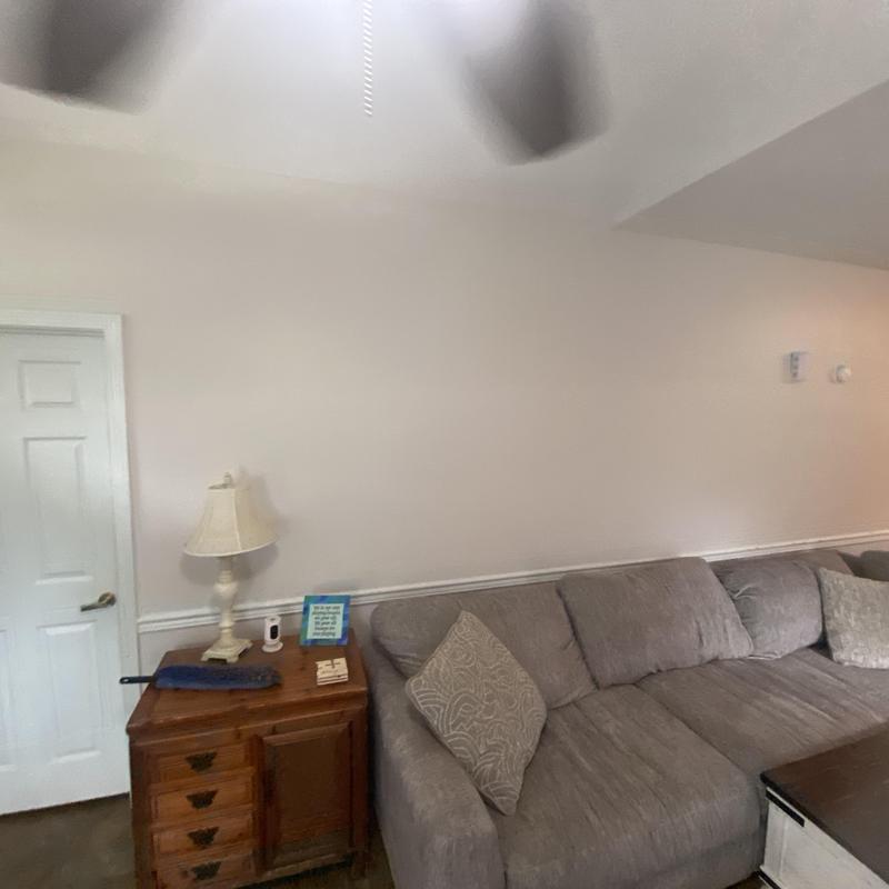 Sheetrock wall and trim with fresh paint in living room Sheetrock wall and trim with fresh paint in living room