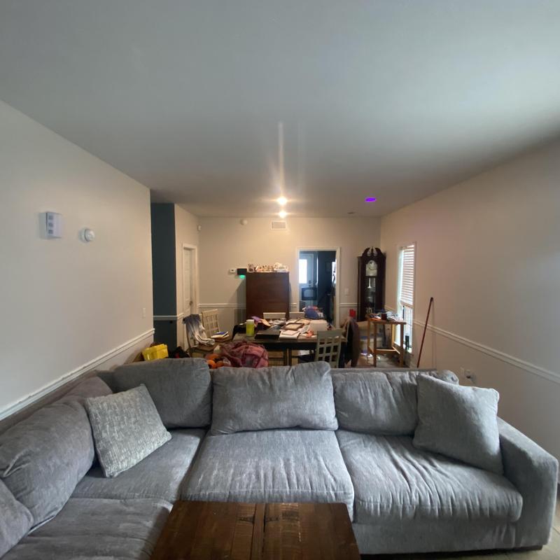 Sheetrock walls with fresh neutral paint in living room Sheetrock walls with fresh neutral paint in living room