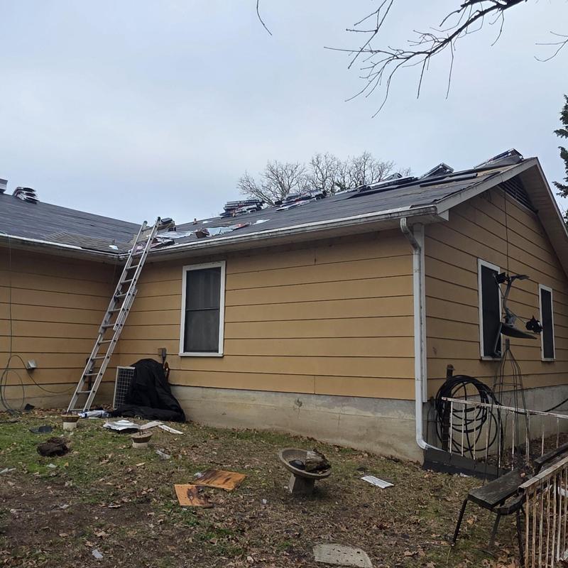 Roofing underlayment installation on residential roof