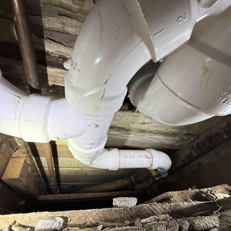 PVC plumbing pipes installation in crawl space replacement