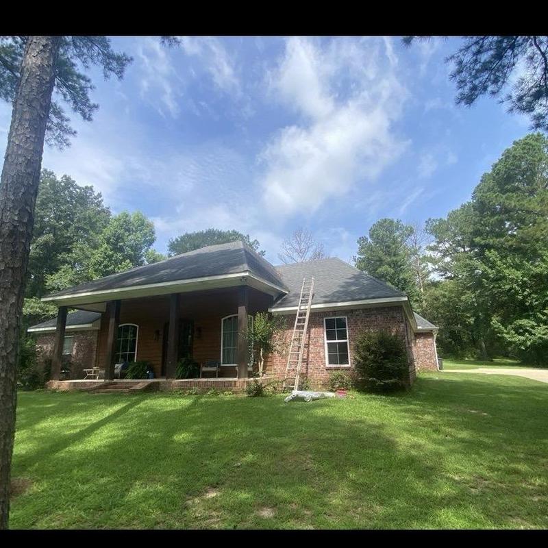 Roof shingles and ladder setup for inspection