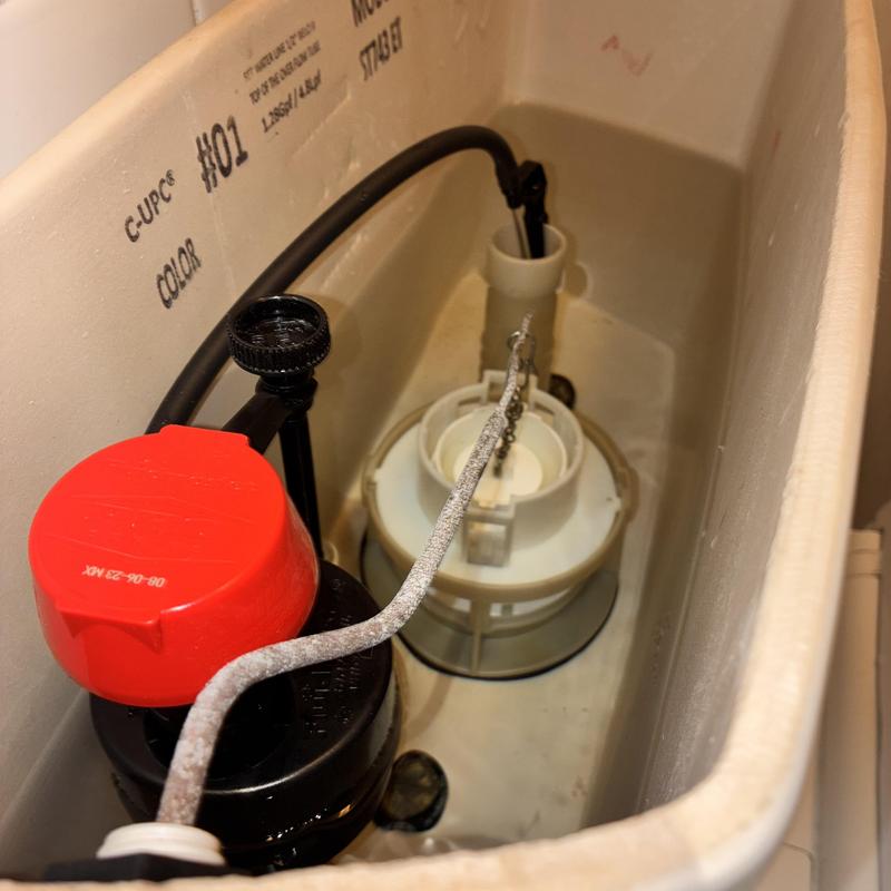 Toto flush valve actuator and tailpiece washer inside tank