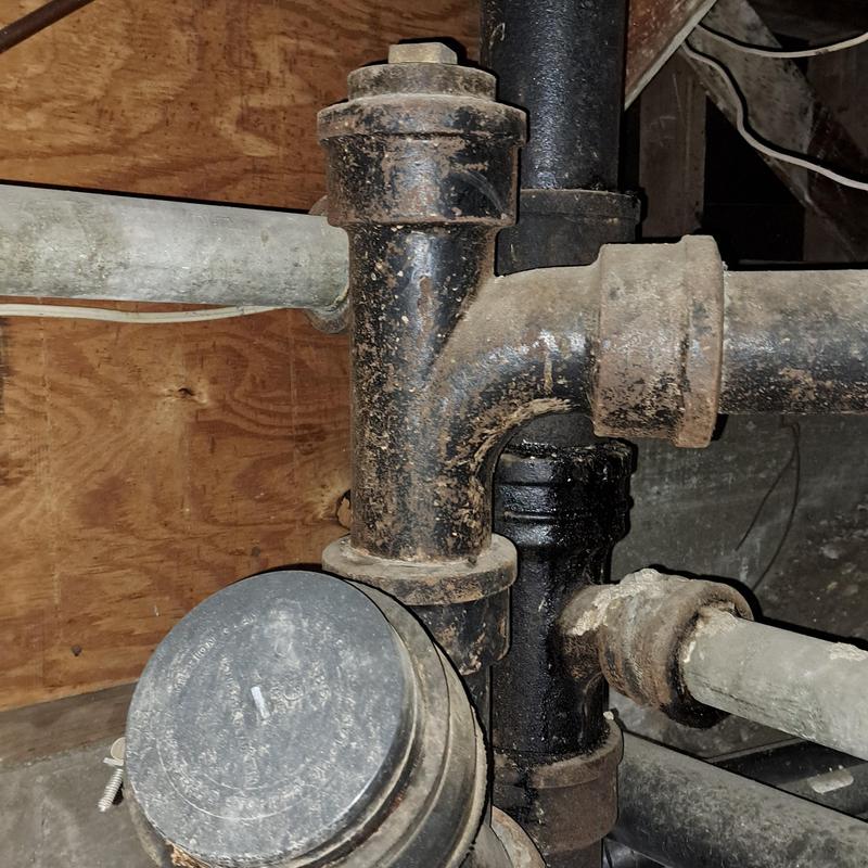 Cast iron drain pipes under basement with fittings Cast iron drain pipes under basement with fittings