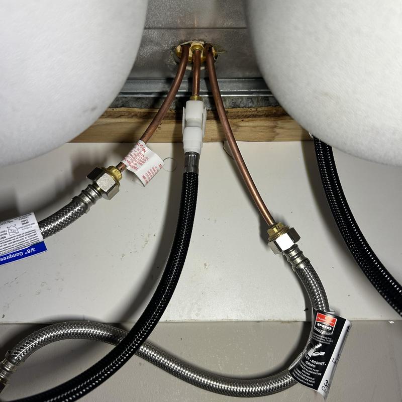 Kitchen faucet water supply lines and connections installed