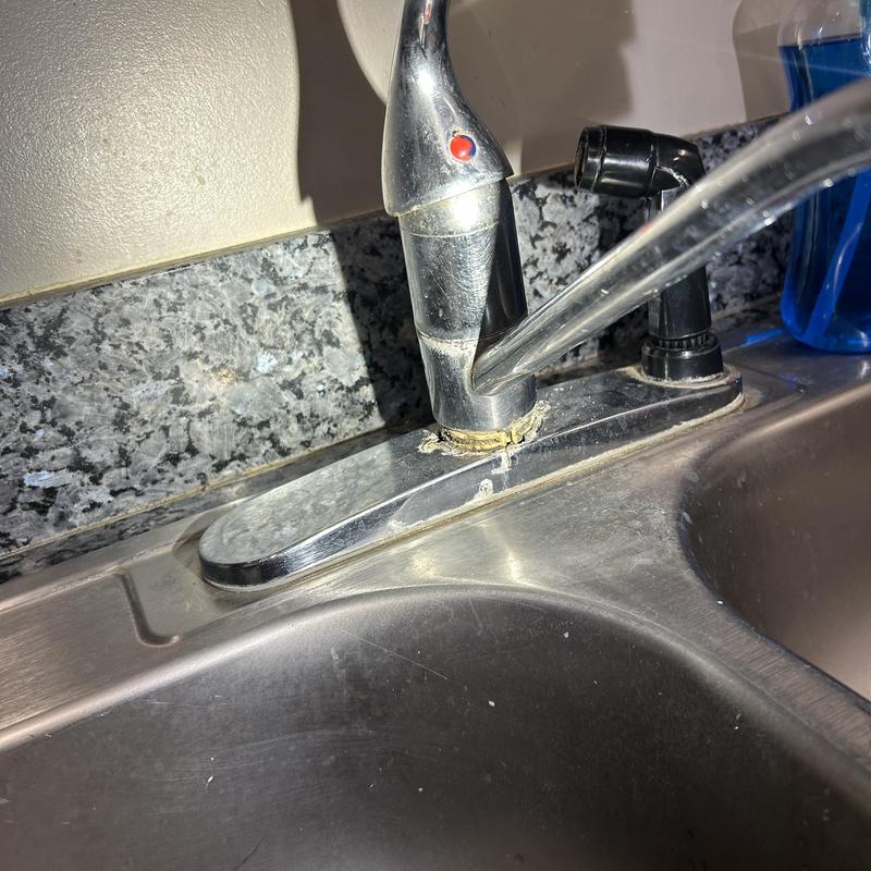 Kitchen faucet with broken spout and sprayer handle